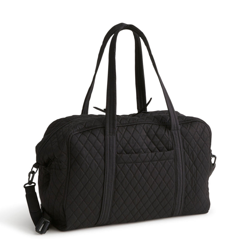 black quilted cotton gym bag with front pocket two long handles and adjustable shoulder strap