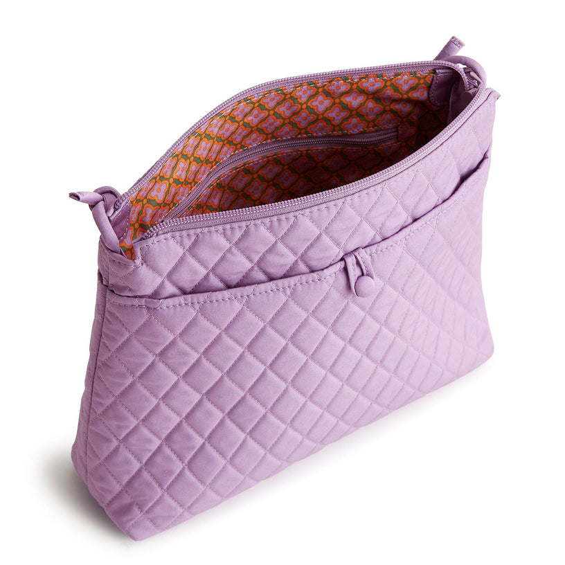 small light purple quilted cotton crossbody bag open to show interior with patterned lining