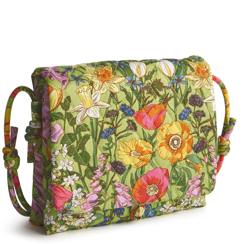 Quilted cotton foldover crossbody back with thin strap and vibrant floral garden pattern