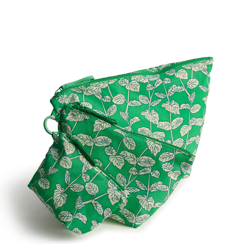 three green zippered pouches with leaf pattern
