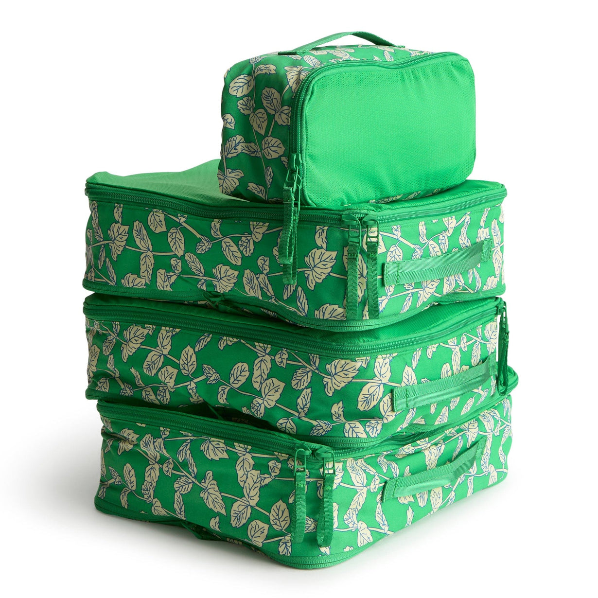 set of four green zippered packing cubes stacked on top of each other